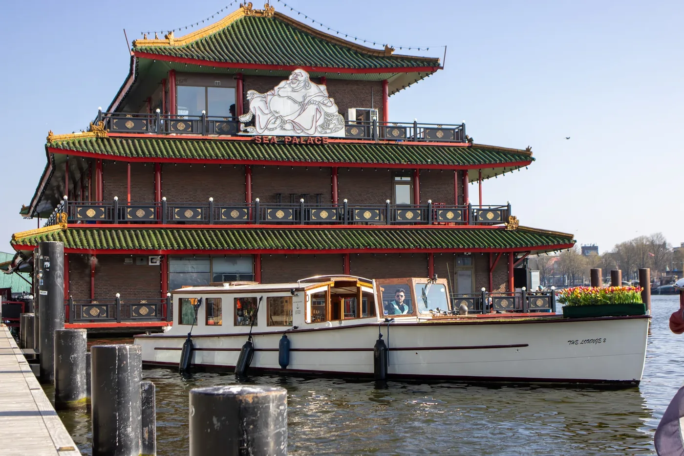 Guests enjoying the cozy boat interior with personalized service during a cruise